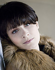 Nina E.